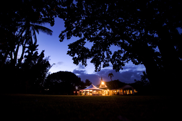 White reception tent at night - wedding photo by Melissa Jill Photography